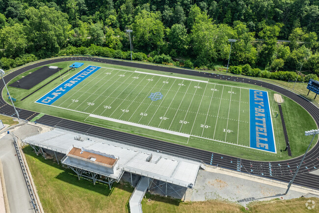 Clay-Battelle Middle/High School has a football field on the side of the school.