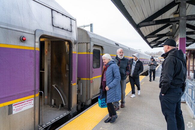 Folks board the commuter rail at Canton Junction in the city of Canton.