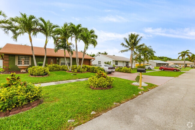 Ranch homes in West Boynton boast classic designs, spacious yards, and a cozy atmosphere.