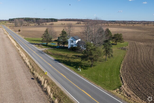 Farm houses surrounded by sprawling fields are a common sight on the roads of Dansville.