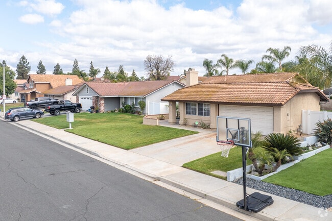 On a street in Orangecrest, you'll find range-style single-family homes with tiled roofs.