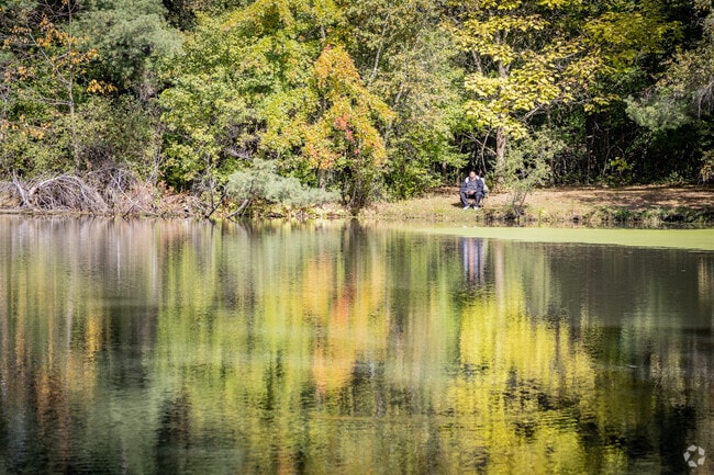 Locals sit and watch birds at Succop Nature Park just outside of Forward Township.