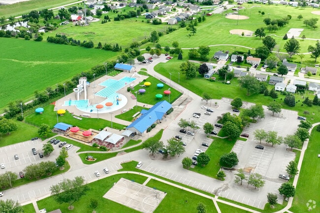Cherry Hill Park Aquatic Center offers a pool, water slide and other amenities.