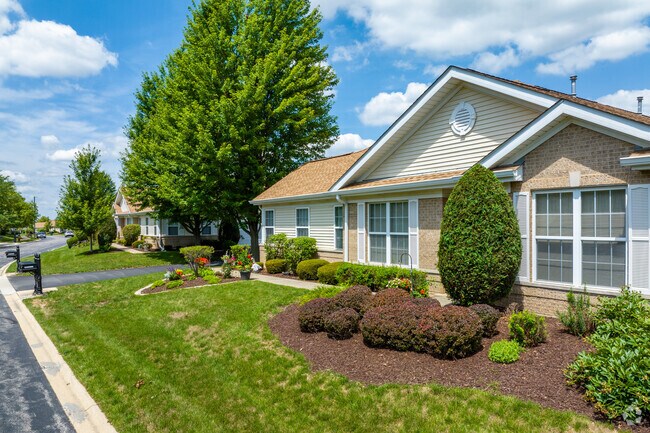 Well maintained lawns and sidewalks are commonplace throughout the Carillon community.