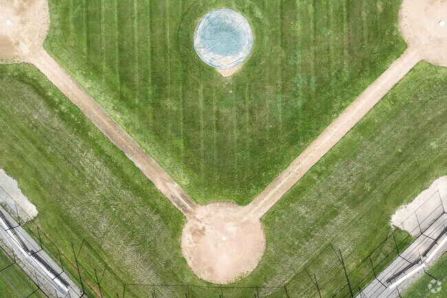 An aerial view of the well maintained baseball field at Thurston Middle School in Westwood, MA.