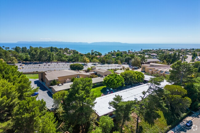 Landscape view of St. John Fisher Elementary School and the distant Californian mountains.