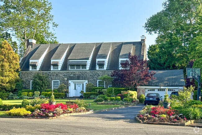 Most of the homes in The Village of Hewlett Bay Park are very large and set back off the road.