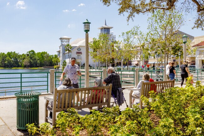 Locals gather around the water in downtown Celebration.