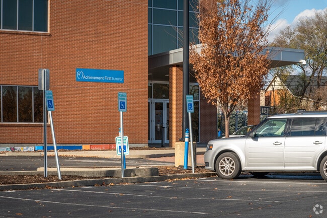 A wide space for handicap parking at AF Iluminar Middle School in Providence.