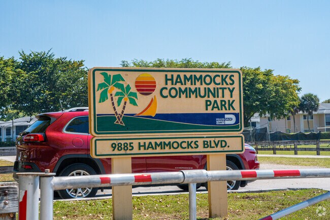 The Hammocks Community Park entrance welcomes local families daily.