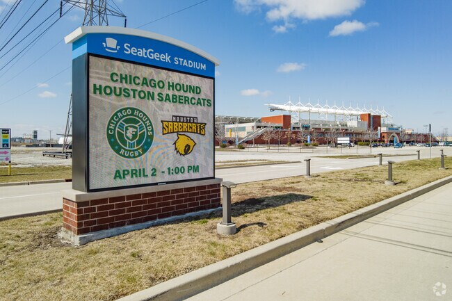 SeatGeek Stadium soccer entrance sign with stadium entrance in view.