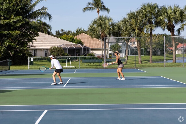 Ladies enjoying the tennis courts at Egret Landing in North Palm Beach Heights.