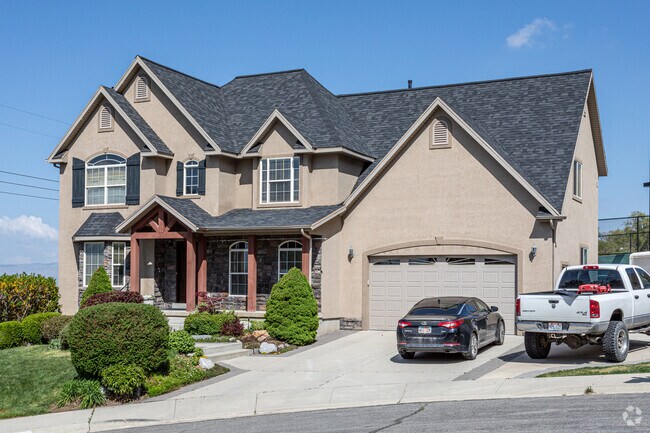 Newly built two-story homes in Little Rock Canyon feature contemporary designs and landscaped yards.