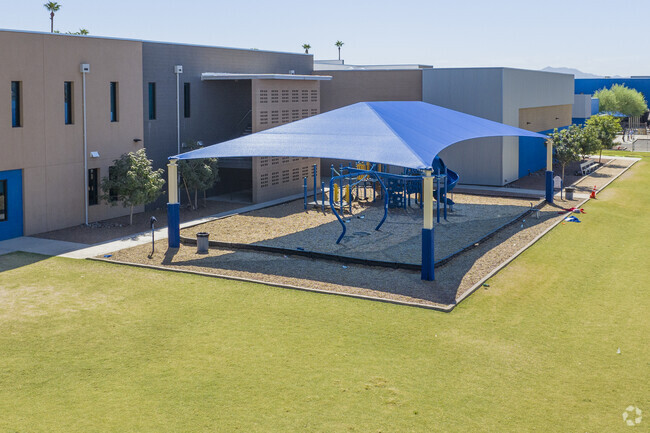 A shaded playground at Vista College Prep Sueño Park offers relief on those warmer Phoenix days.