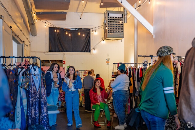 Locals make their way to Warehouse XI to browse at all the fun items at Spooky Swap XI.