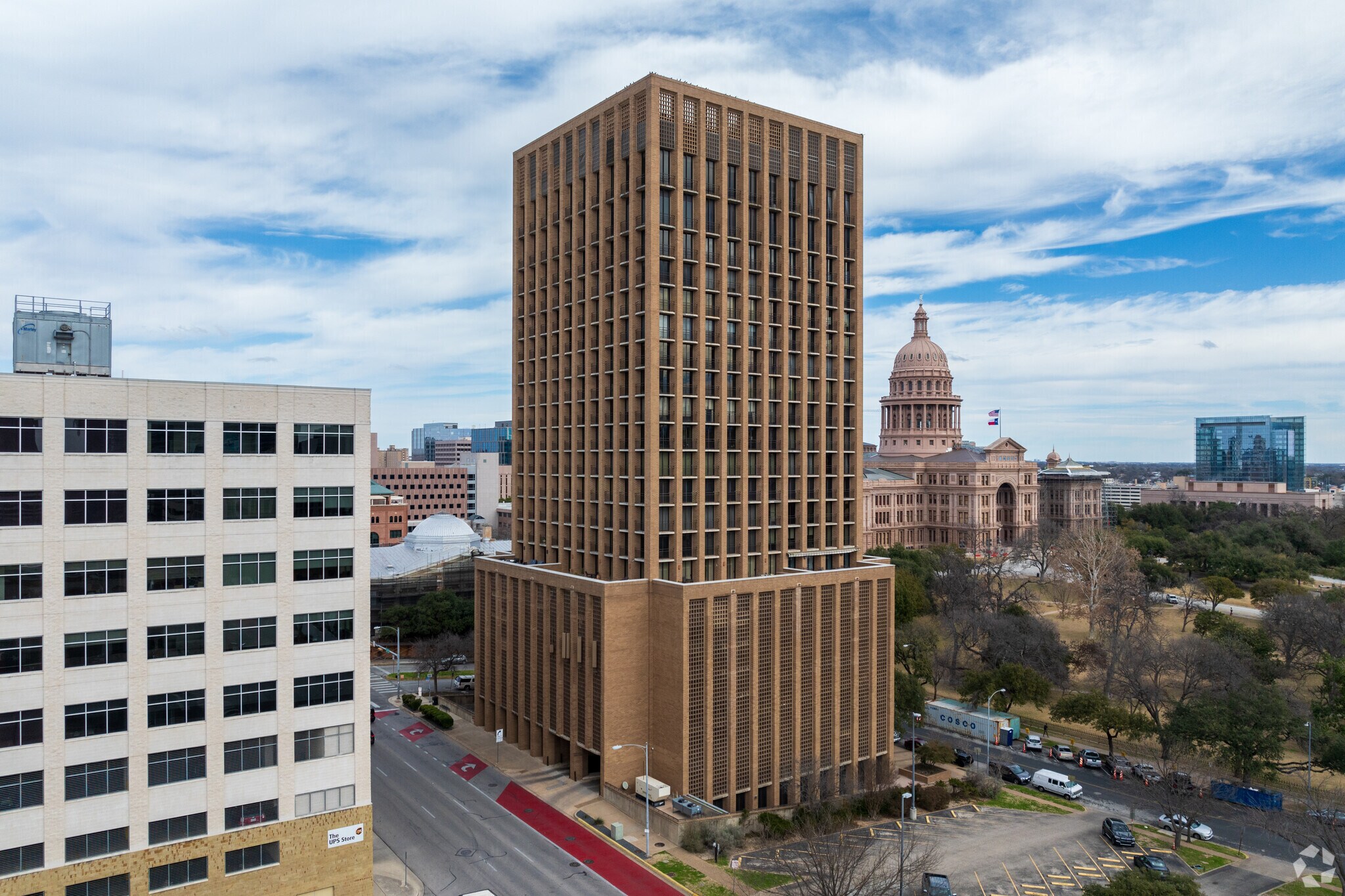The West Gate Tower adds to the skyline of Uptown, offering modern living spaces with a view.