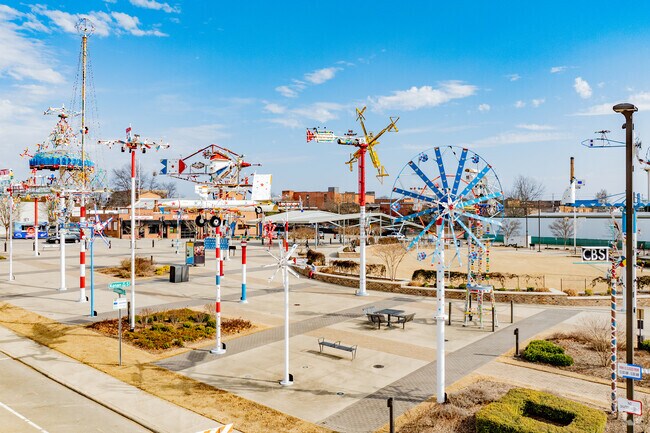 Creative metal “whirligig” sculptures hover over the Vollis Simpson Whirligig Park and even light up at night.