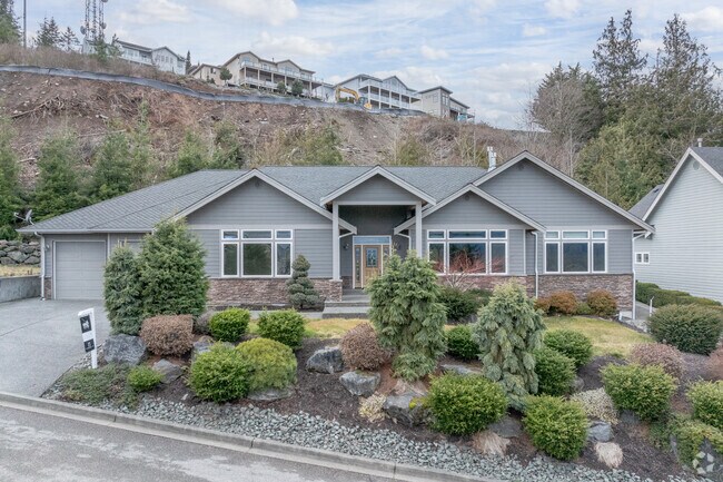 Find serenity in a postmodern home with breath taking views in Burlington.