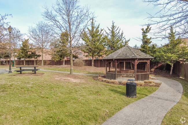 A gazebo and picnic area await near a paved walking path in Bailey’s Crossroads.