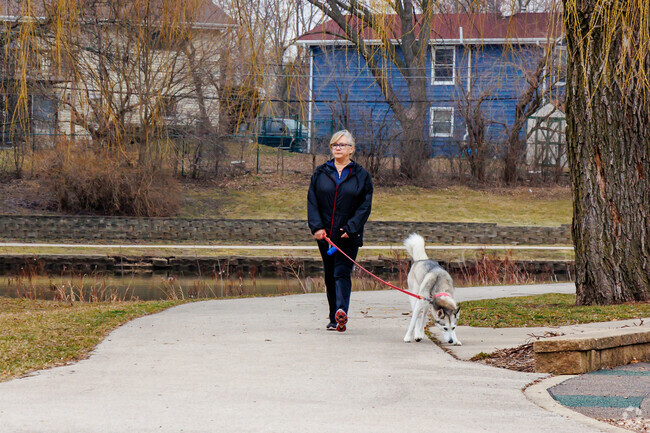 Residents of High Point Park enjoy plenty of green space for walks with their dog.