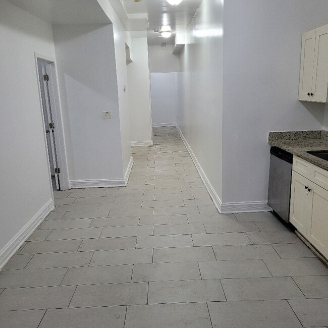 6751 S Clyde Ave unit Bsmt, Chicago, IL 60649 - photo 2