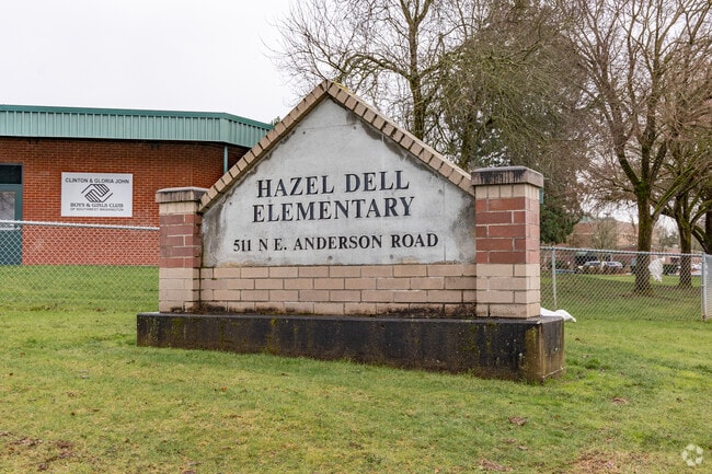 The brick and concrete sign for Hazel Dell Elementary School in Vancouver, WA.