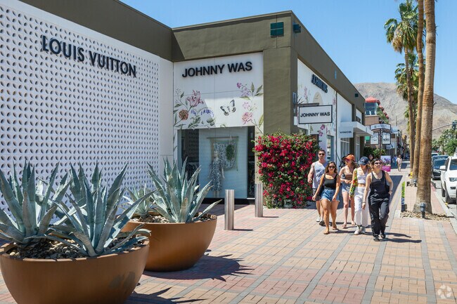 El Paseo features luxury stores like Louis Vuitton near the University Neighborhood.