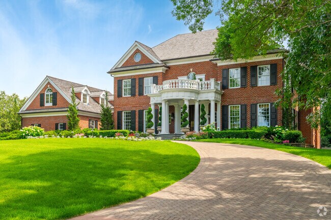 A colonial style house in the Rolling Green - Hilldale neighborhood.