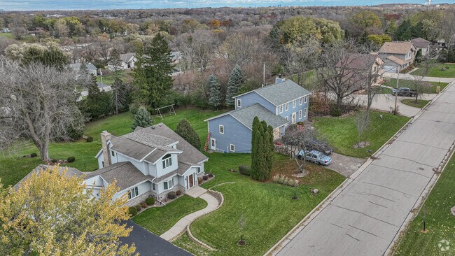 Find unique architecture and perfect lawns in Greenfield.