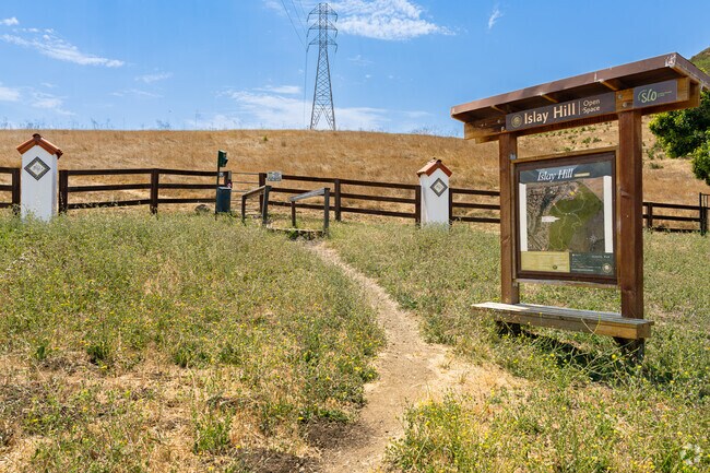Take a morning hike up the Islay Hill through the open space adjacent to neighborhood homes.