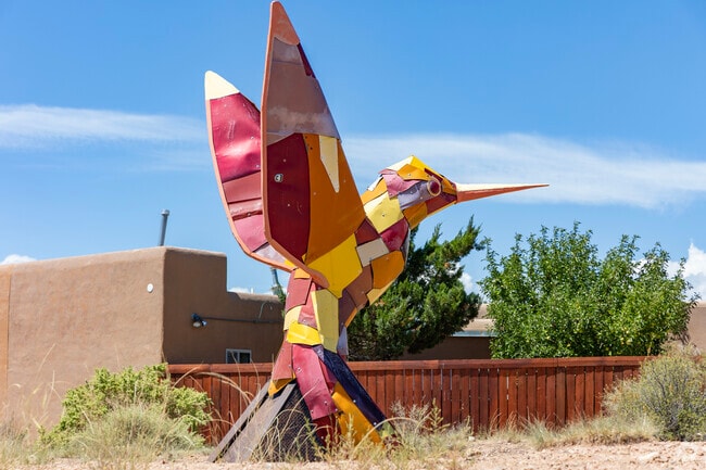 A colorful hummingbird statue in Agua Fria.