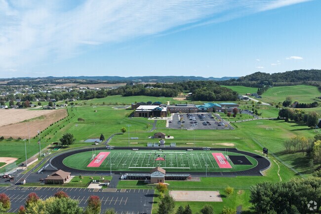 Arcadia High School offers dual enrollment courses and has a track and football field on campus.