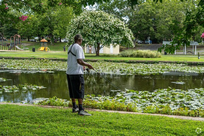 A fisherman tries his luck catching snakehead in the Wicomico River at Salisbury City Park.