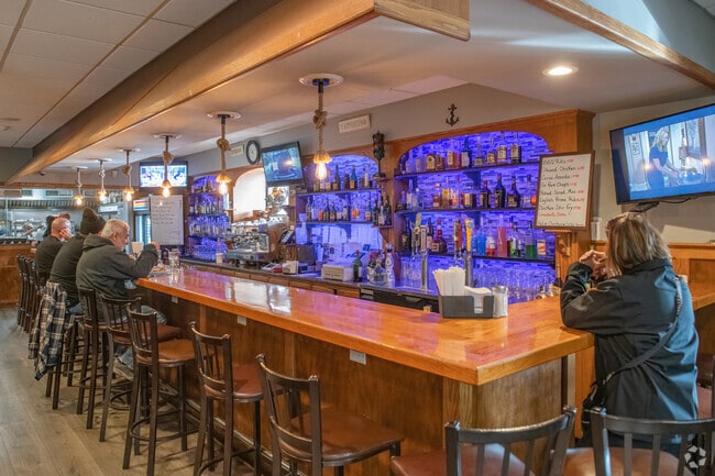The bar at Captains Place Restaurante in Acushnet is always hopping and a communal place to eat.
