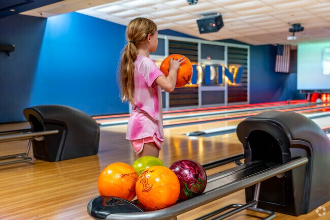Headpinz as a popular spot for bowling and arcade games alike.