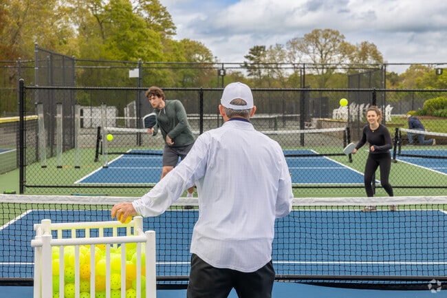 Residents practice their pickleball skills at Wychmere Tennis Club in East Harwich.