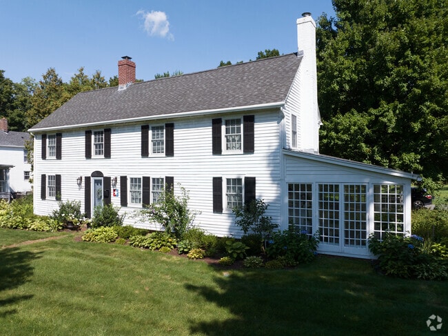 Built in 1805 this historic colonial has a a lovely sun room as well in historic Longmeadow.