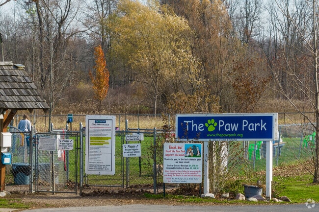 The Paw Park is a friendly dog park to play fetch with pets in East Amherst.