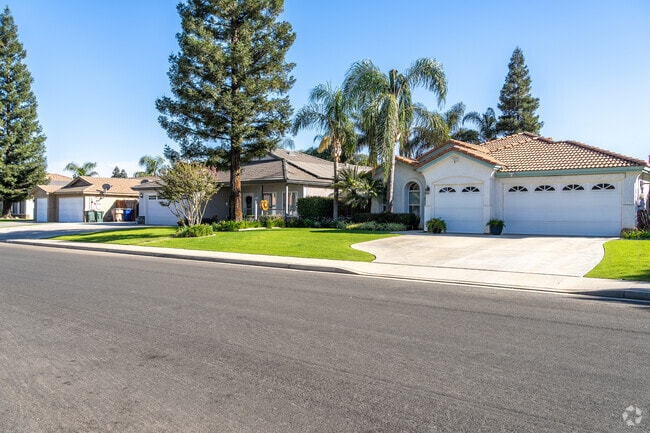 In Hampton Woods, you'll discover homes featuring tile roofs in a row.