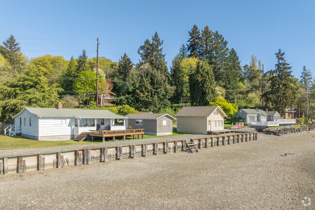 Rows of cottages share private beach access around Vashon Island.
