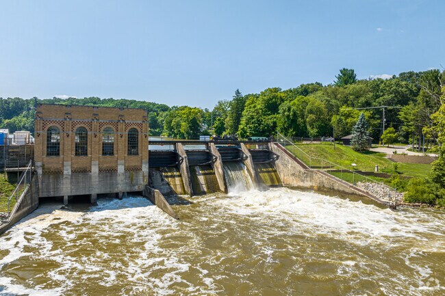 Leslie E. Tassell Park features the Cascade Dam, a local landmark in Cascade Township.