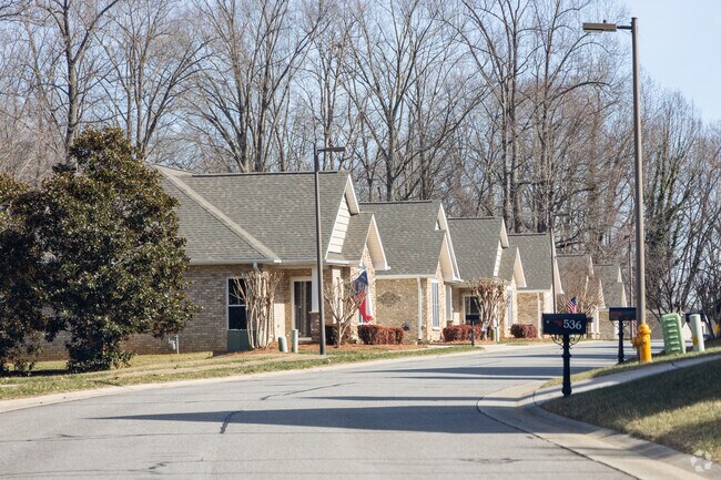A neighborhood oasis: welcome to blissful abode row in Abbotts Creek.
