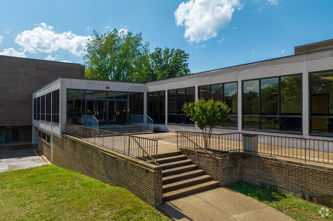 The student entrance in the back of Alexis I. duPont High School.