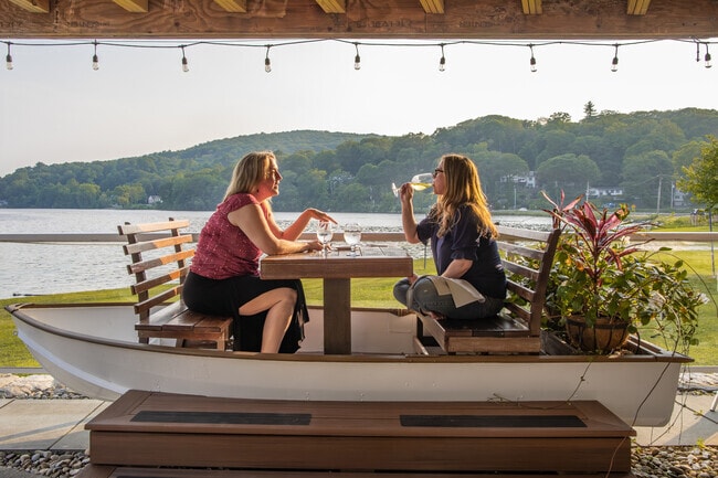 Blue Heron sits near the lake with open-air tables and a relaxed vibe that locals return to when the sun is out.