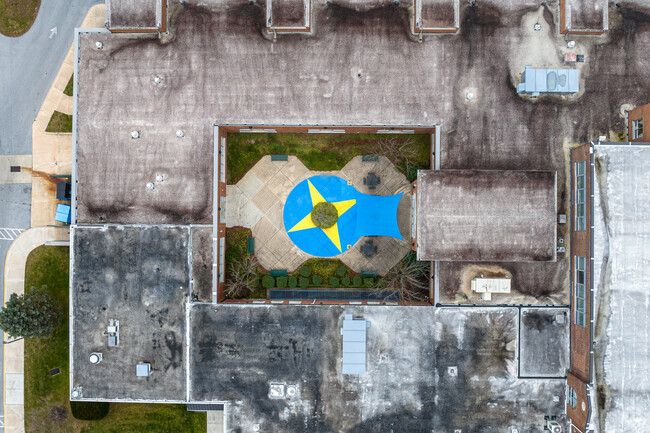 The courtyard at Unionville Elementary School is painted in vibrant hues.