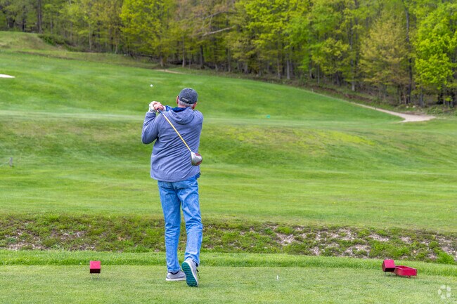 Charlotte Golfers and tee off at the Cassadaga Country Club.