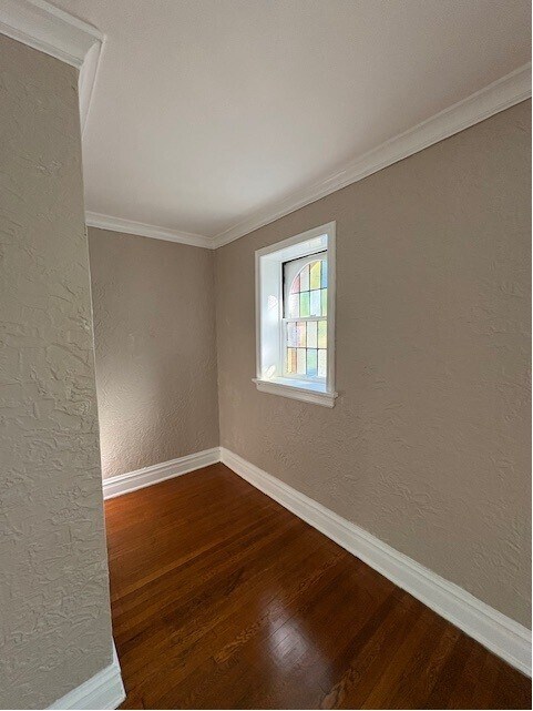 Cozy reading nook with stained glass window