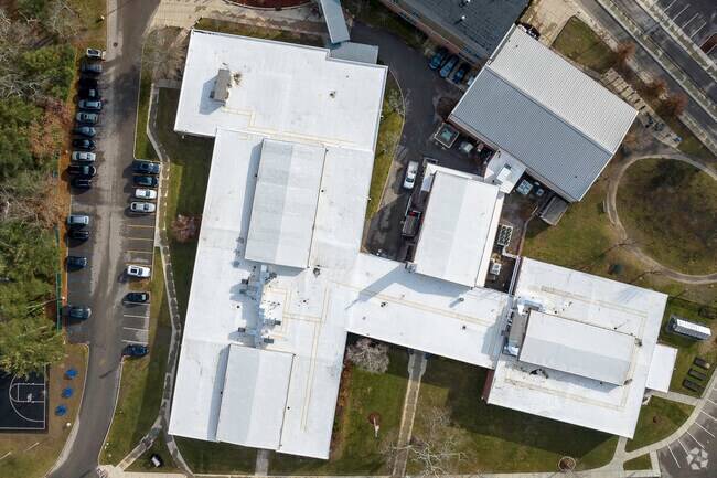 Aerial top-down view of Foxborough Regional Charter School in Foxborough, MA.