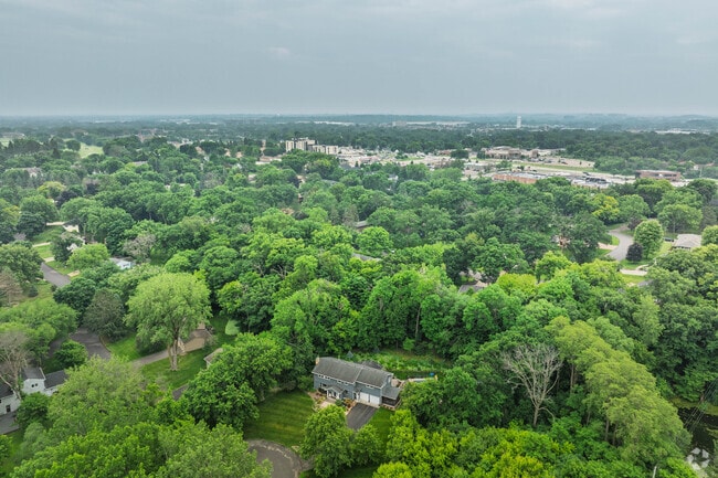 Unlike rapidly developing western suburbs, Minnetonka Mills maintains its established character with selective redevelopment that preserves the neighborhood's midcentury charm and mature landscape.