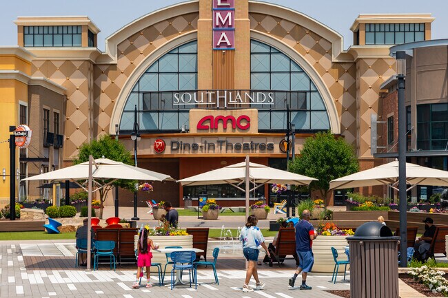 Enjoy a movie after a day of shopping at Southlands mall near Spring Creek Meadows.